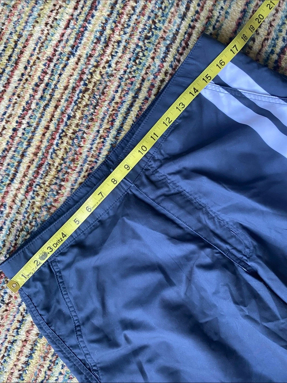 Retromarine navy swim trunks with white stripes